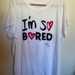 White Graphic Tee with Black and Pink Print